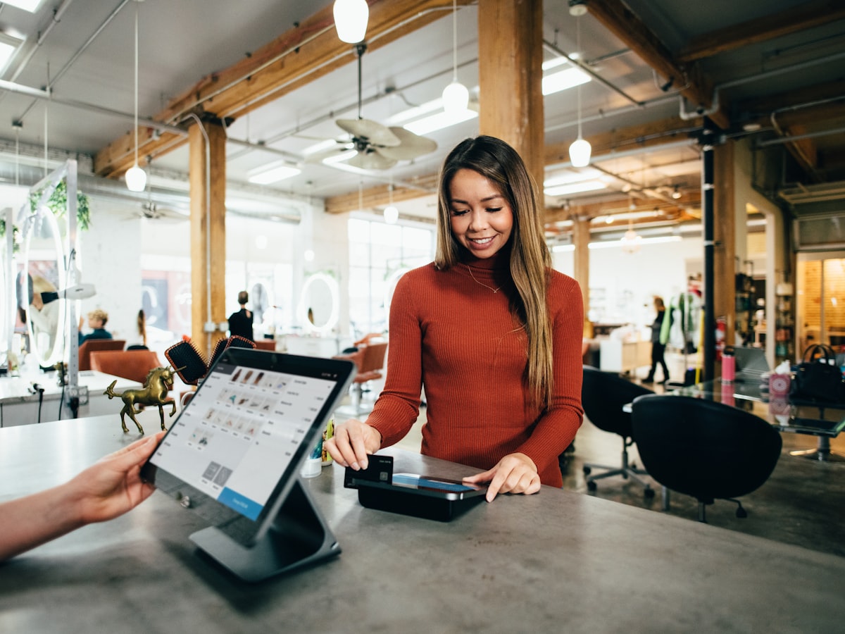 Guest paying at the table
