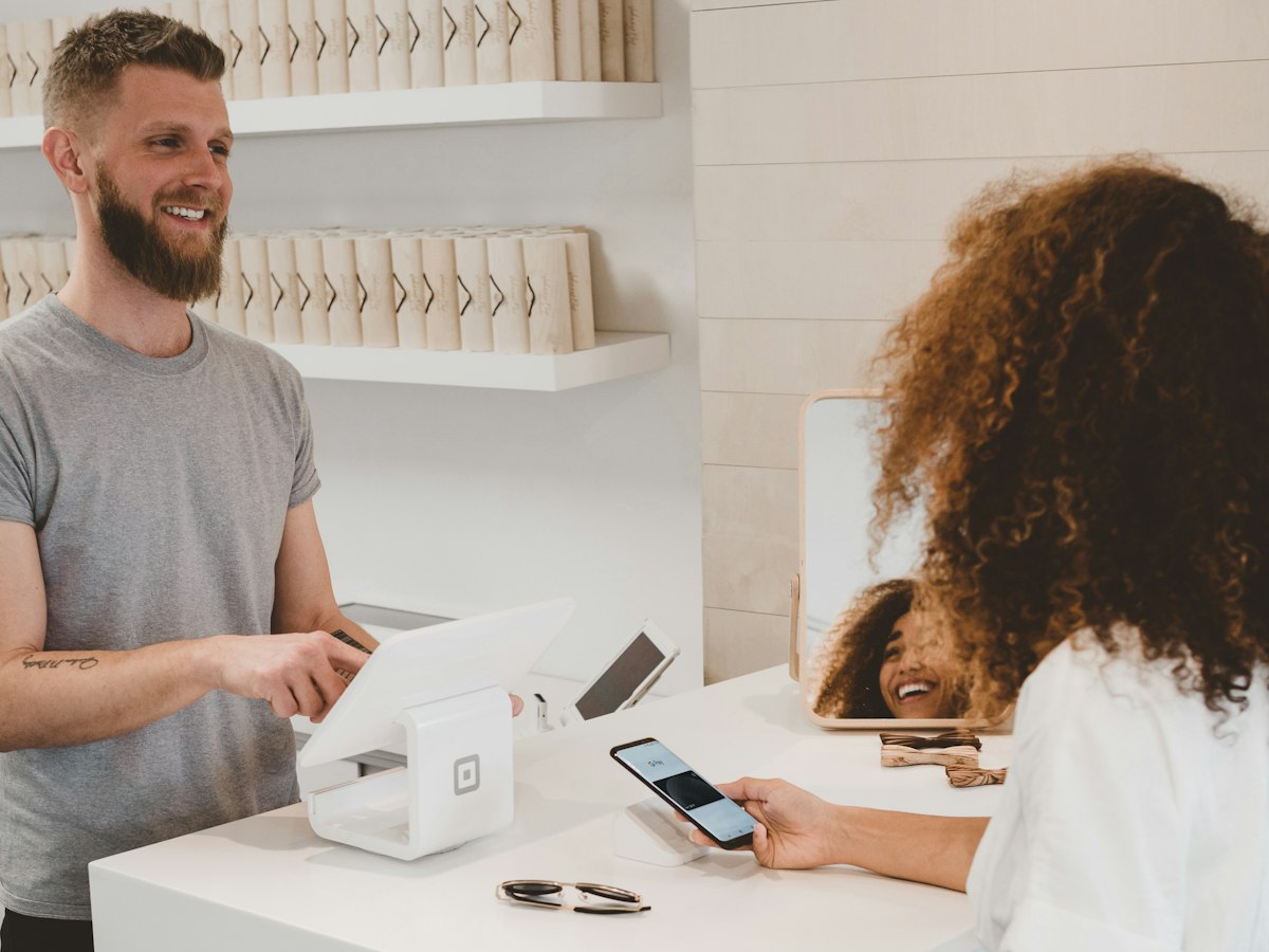 Taking a payment at the counter